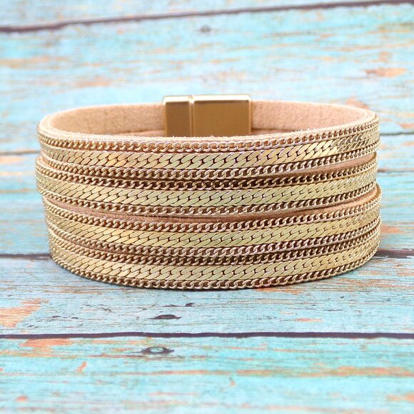 Wide gold chain bracelet with four rows of chain backed with a soft suede. - Picture 3 of 12